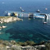 Costa Concordia leans on its side after running aground.