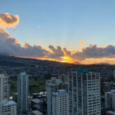 Sunrise in Honolulu, Hawaii, with high-rises in the foreground.