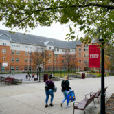 Students walk on the campus of Indiana University of Pennsylvania in Indiana, Pa.