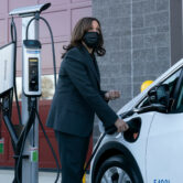 Vice President Kamala Harris charges an electric vehicle in Maryland.