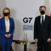 Liz Truss and Antony Blinken wearing face coverings.