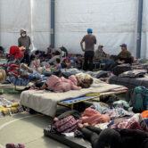 Migrants rest in Mexico City shelter