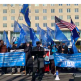 Salih Hudayar, founder and president of the Eastern Turkistan National Awakening Movement, speaks during a protest against China's genocide of Uyghurs outside of the U.S. State Department on Dec. 22, 2021.
