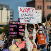 People attend the Women's March ATX rally in Austin, Texas.