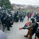 Rioters face off with police at the U.S. Capitol on Jan. 6, 2021.