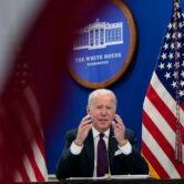 Joe Biden speaks during a meeting on the White House campus.
