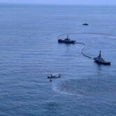 Cleanup efforts of a large oil spill off the coast of Thailand.