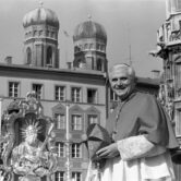 Cardinal Joseph Ratzinger, later Pope Benedict XVI, smiles in Munich, Germany.