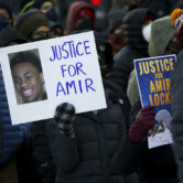 Amir Locke protest signs