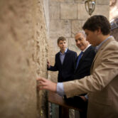 Benjamin Netanyahu and his sons pray at the Western Wall.