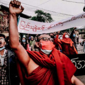 A Buddhist monk marches during a protest in Myanmar.