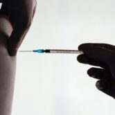 A man receives a Covid-19 vaccine dose in Berlin, Germany.