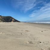 White sand and bluffs at Gaviota State Beach, California.