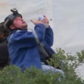 Capitol rioter clearing pepper spray