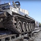 Russian army tanks on railway platforms