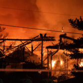 A structure fire burns at the Weaver Fertilizer Plant in Salem, N.C.