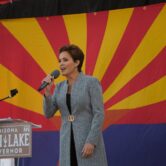 Kari Lake speaks to the audience at her gubernatorial rally in Morristown, Ariz.