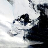Satellite photo of a collapsed Antarctic ice shelf.