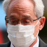 Greg Kelly walks in to the Tokyo District Court in Tokyo.
