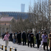 Residents line up for Covid-19 tests on Monday, March 14, 2022, in Beijing.