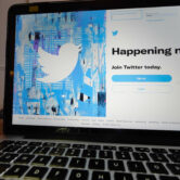 Twitter's login screen is seen on a laptop.