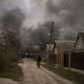 A factory and a store burning in Ukraine