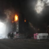 A burning building in in Kyiv, Ukraine