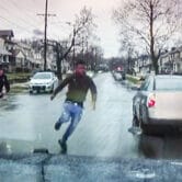 Officer Christopher Schurr appears to chase Patrick Lyoya in a still image from a video.
