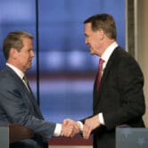 Georgia Republican gubernatorial candidates shake hands at a debate