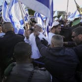 Israeli police block right-wing activists from marching toward the Old City, in Jerusalem.