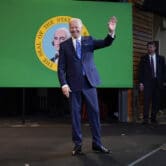 Joe Biden waves as he leaves after speaking at Green River College.