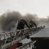 Firefighters extinguish a fire in Kharkiv, Ukraine