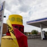 Crime scene tape at a Chicago gas station