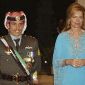 Queen Noor stands with Prince Hamzah during his wedding ceremony in Jordan.