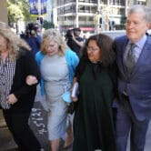The family of Scott Johnson arrives at the Supreme Court in Sydney, Australia.