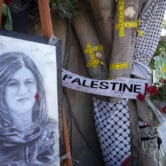 A makeshift memorial for slain journalist Shireen Abu Akleh.