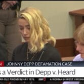 Amber Heard reacts to the verdict in a defamation case brought by Johnny Depp