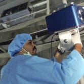 A U.N. inspector sets up surveillance equipment in an Iranian uranium facility.