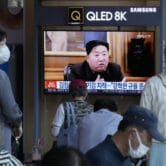 North Korea leader Kim Jong Un is seen on a TV news show