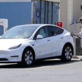 A Tesla car at a charging station