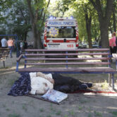 Blood covers and flows away from a dead Ukrainian civilian.