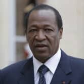 Blaise Compaoré speaks to the media after a meeting in Paris.