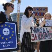 Climate activists demonstrate outside the European Parliament in France.
