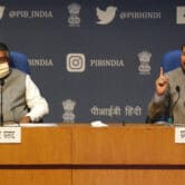Indian officials speak during a press conference announcing new social media regulations.