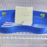 A dish with syringes containing the Novavax Covid-19 vaccine.