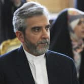 Ali Bagheri Kani listens during a meeting in Iran.