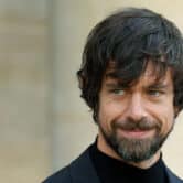 Jack Dorsey smiles while walking in France.