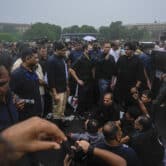 Lawmakers participate in a protest in New Delhi, India.
