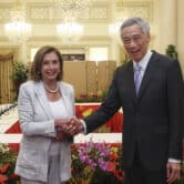 Nancy Pelosi and Lee Hsien Loong shake hands in Singapore.