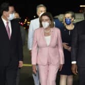 Nancy Pelosi walks with Joseph Wu in Taipei, Taiwan.